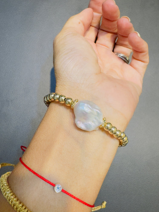 Pulsera perla barroca natural con bimetal