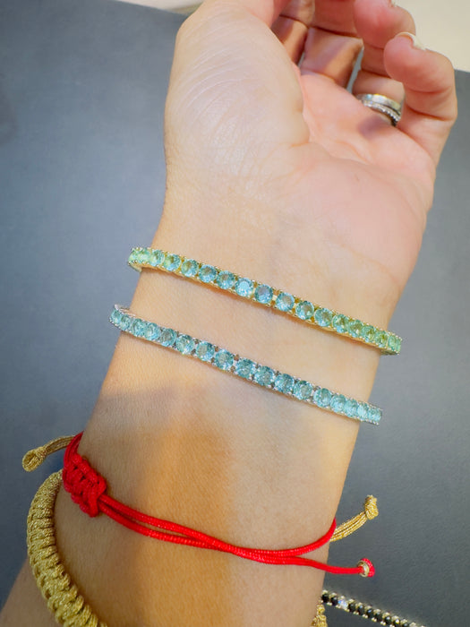 Pulsera tennis plata .925 rodizada o con baño de oro amarillo Zirconia color Turmalina paraiba