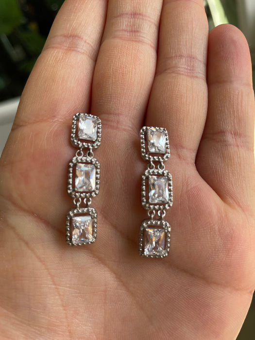 Aretes largos plata rodizada y zirconia