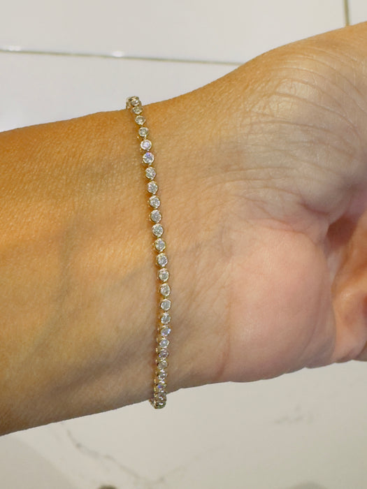 Pulsera oro amarillo con bicel diamantes naturales (1 cts )