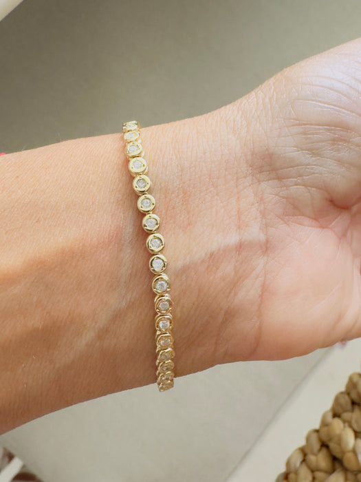 Pulsera tennis oro amarillo 14k bicelada de diamantes naturales (1.50 cts)
