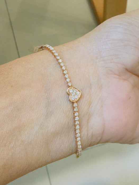 Pulsera tennis oro rosa 14k con dije de corazón y diamantes naturales (.50 cts)