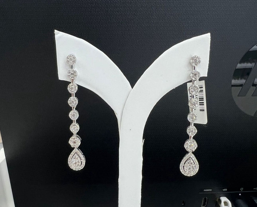 Arete largo gota oro 14k con diamantes naturales