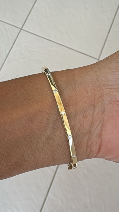 Aro oro amarillo 14k con diamantes naturales (.25 cts)