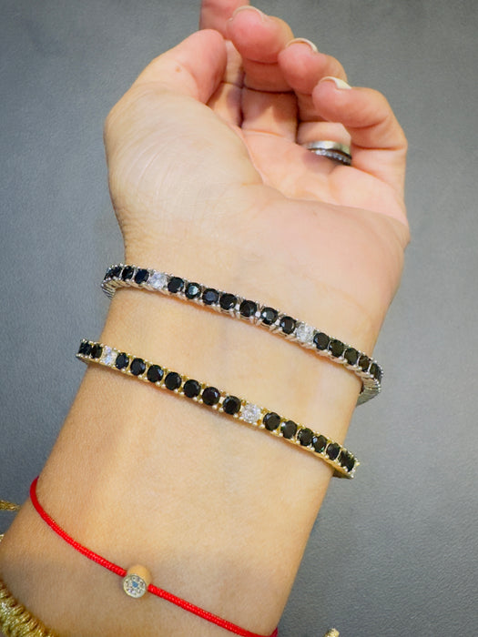 Pulsera tennis plata .925 rodizada o con baño de oro amarillo Zirconia combinada negra y blanca