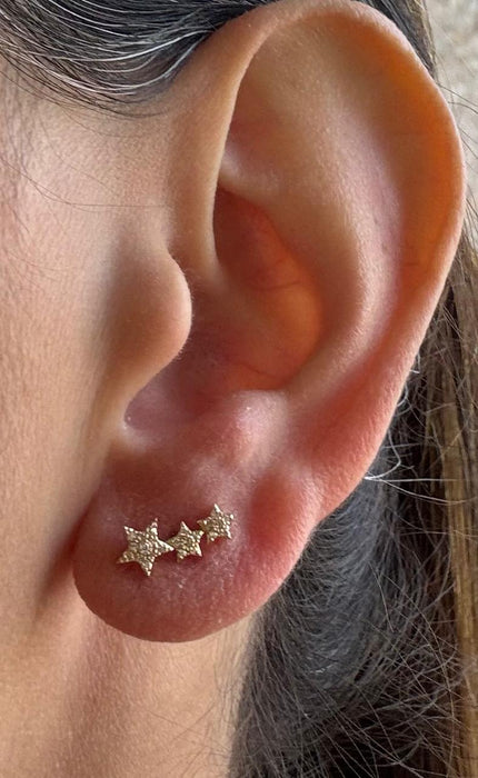 Broquel 3 estrellas oro 14k con diamante natural