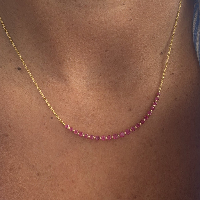 sonrisa 14K con rubís