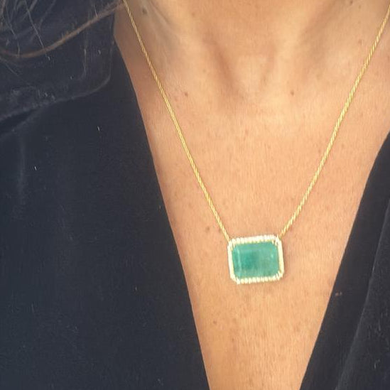 14K esmeralda y diamante 8.62 cts
