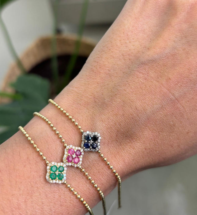 Pulsera flor 14k rubí, zafiro, esmeralda y diamante